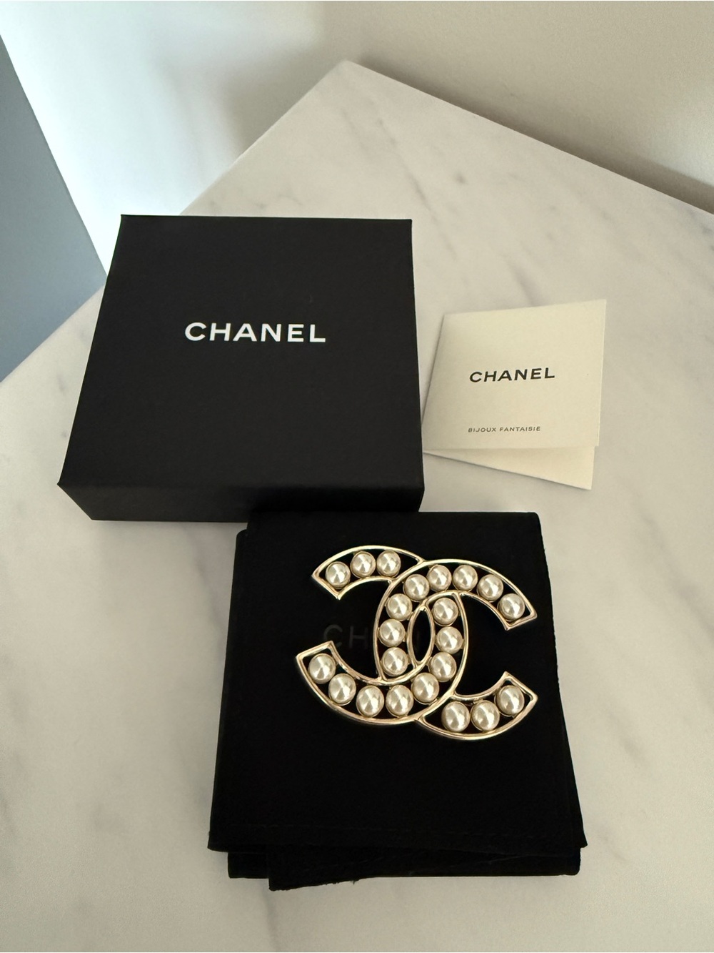CHANEL Gold and Pearl Interlocking CC Brooch